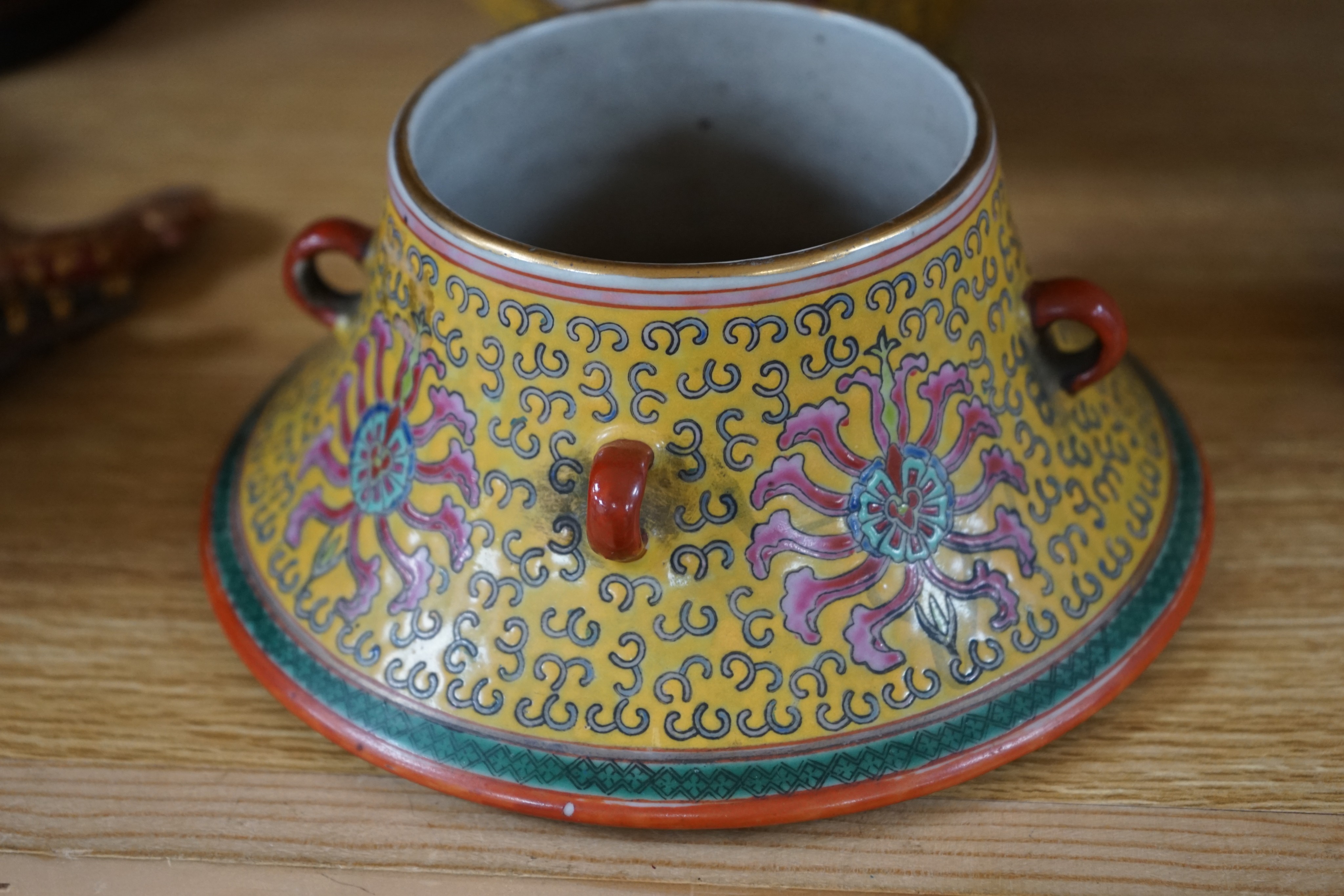 A Japanese porcelain cylindrical vase and a Chinese yellow ground two-section vessel and cover, 29cm